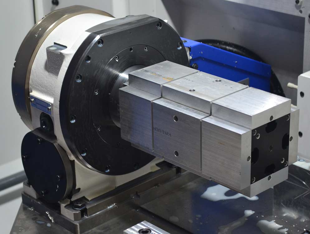 3 inch double station tombstone vise mounted to a 4th axis rotary